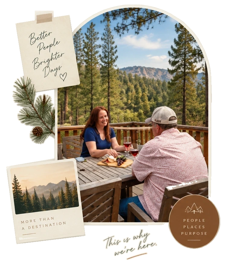 A taped note reading Better People Brighter Days, a pine bough, and an arch framed photograph of two guests sharing a meal on a deck above the pines